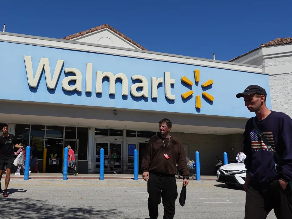 Walmart stock surges to all-time highs as sales jump even as other companies see consumers turn cautious