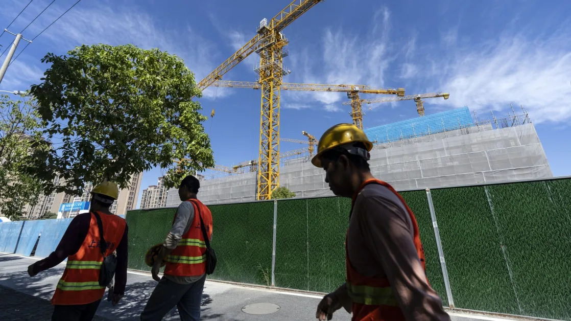 China’s Regulators Vow to Stabilize Property, Stock Markets