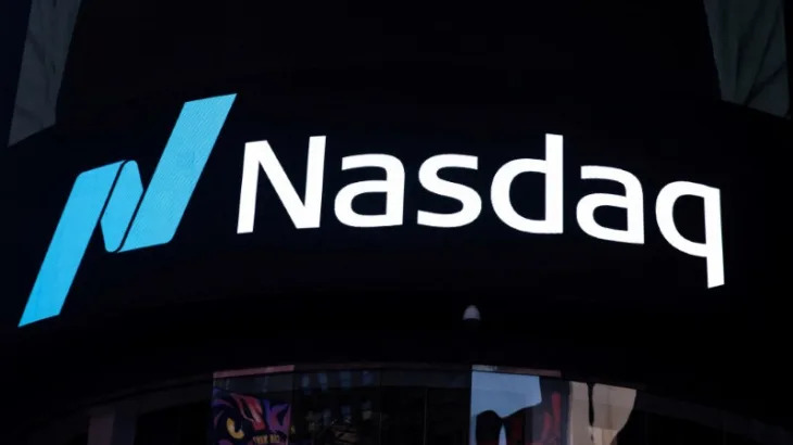 Nasdaq closes at record as investors prepare for Fed rate decision