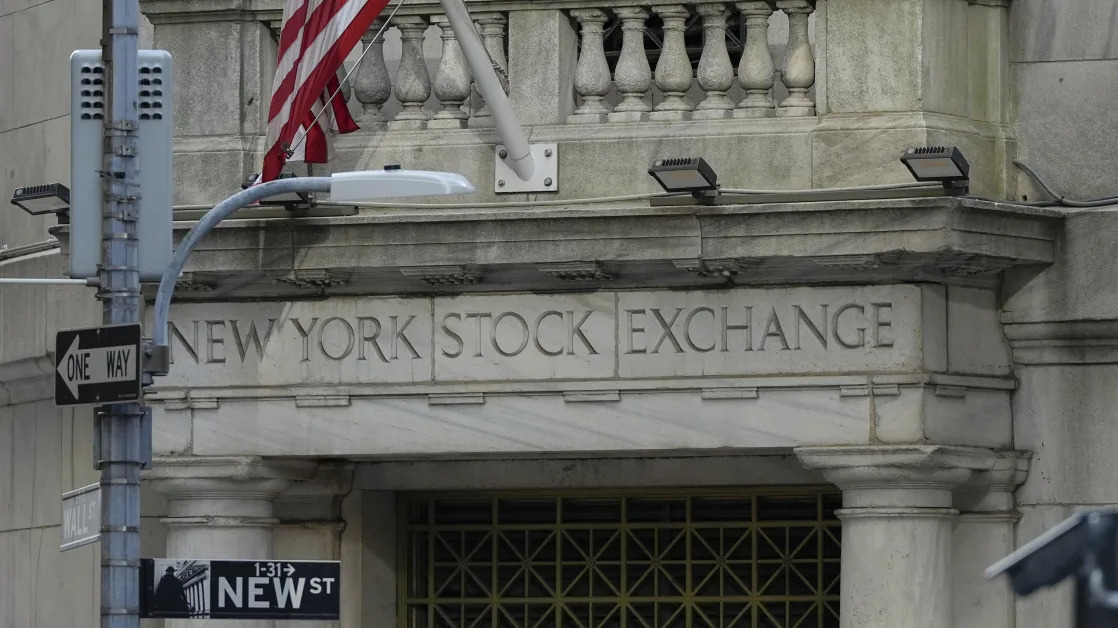Stock market today: Discouraging economic reports knock Wall Street further from its record