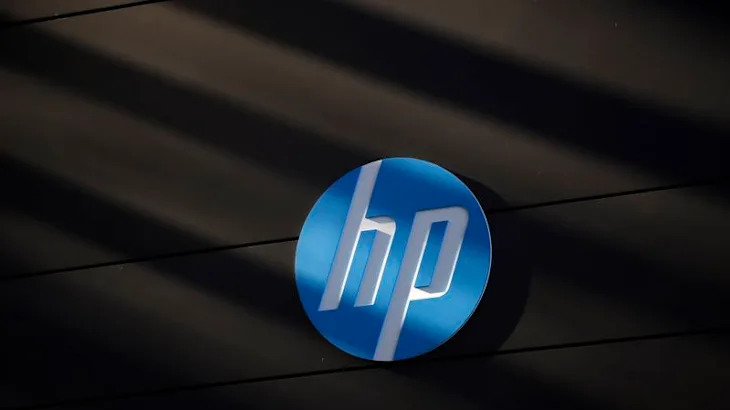 HP tops revenue estimates on PC market recovery; shares dip on weak profit view
