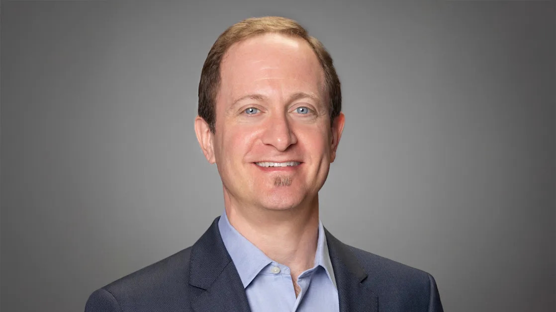 The marketing executive who curates your pre-flight ads says traveling for business is crucial to his career success: ‘I travel to learn’