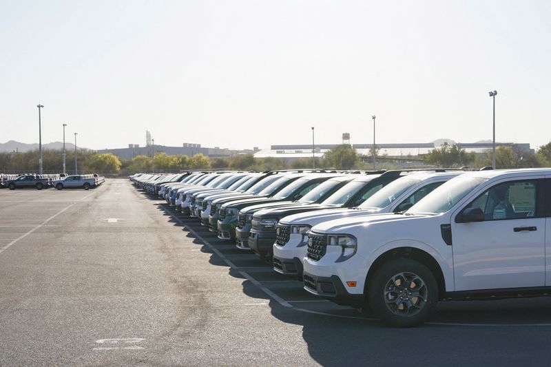 Investors react as Trump auto tariffs rattle markets