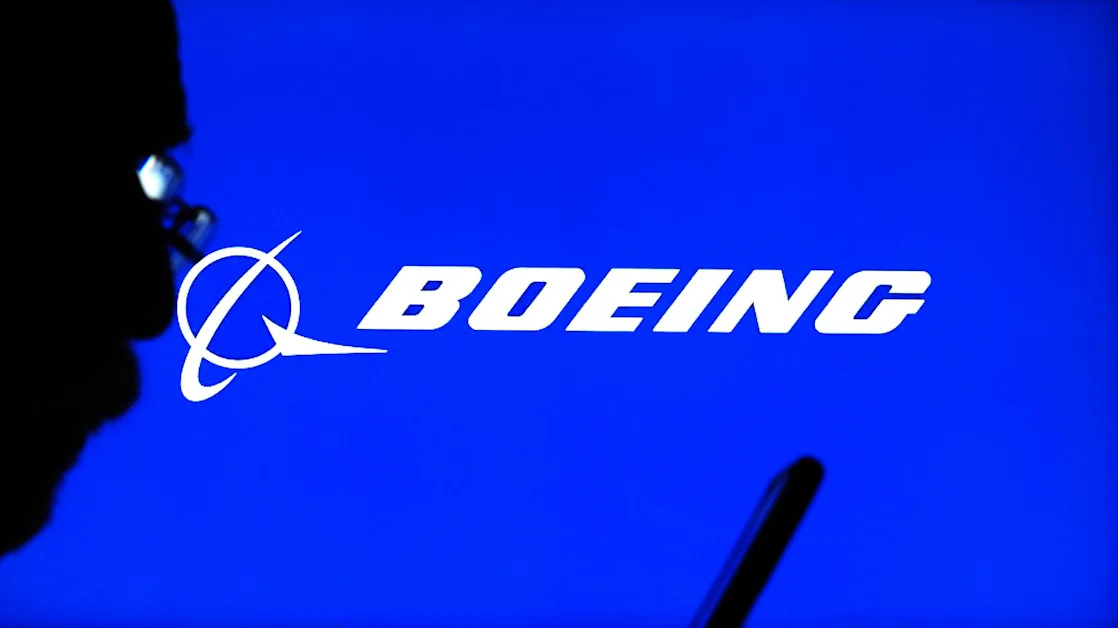 Top Stock Movers Now: Boeing, DuPont, Tesla, and More