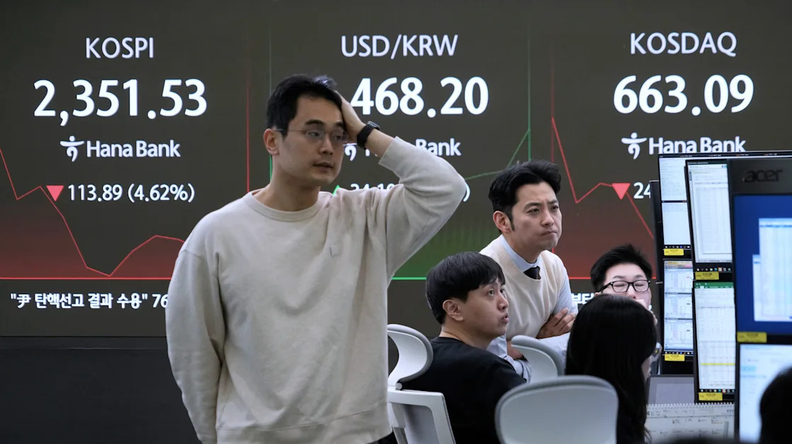 The Latest: Stocks are making wild swings as markets assess the damage from Trump's trade war
