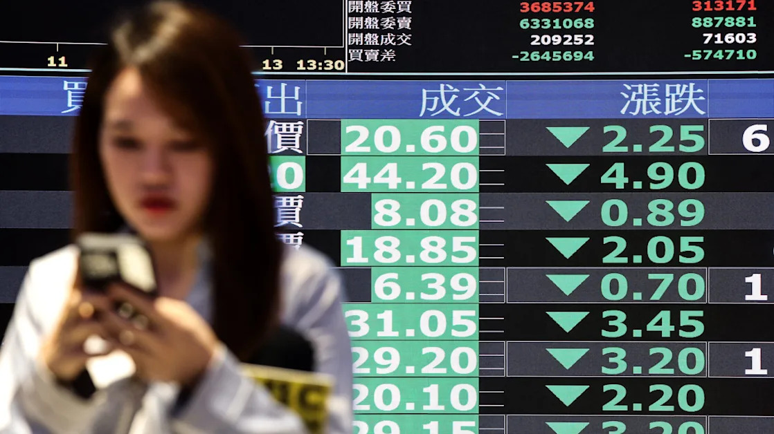 Asia markets ended mixed after volatile trading