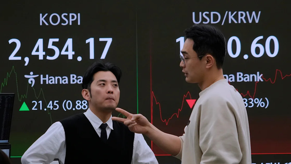 Asian markets rally after Wall Street ends higher in the chaotic and historic week