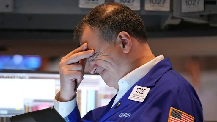 Photos show reactions at the New York Stock Exchange as Trump's tariff announcements sent markets crashing and soaring