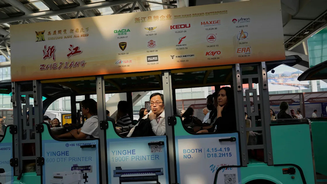 AP PHOTOS: Exporters at China’s largest trade fair look to non-US markets for survival