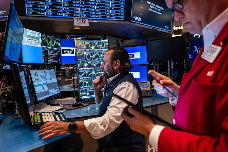 Investors shrug off Moody's downgrade as stocks, U.S. borrowing costs stay largely flat