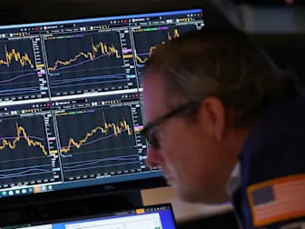 Trading Day: Dealing with the US downgrade