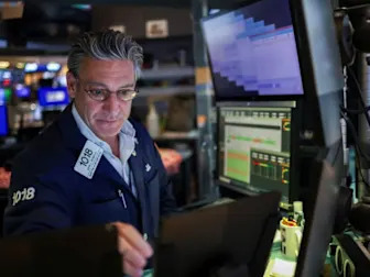 Tech stocks drag Wall St lower ahead of Fed commentary