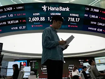 Asian shares slip as worries about U.S. debt send Wall St tumbling