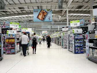 UK shoppers more upbeat but cut back on retail spending