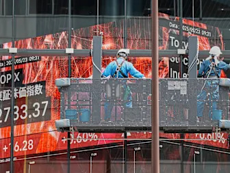 Asian stocks rise and oil prices slip after Treasury yields ease