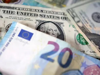 Euro jumps, dollar swoons as Trump relents on EU tariff threat