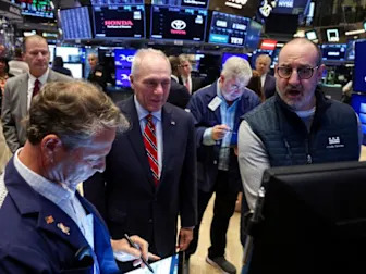 Trading Day: Teflon stocks glide higher