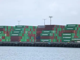 Tariff-fueled surge in container shipping rates shows signs of peaking