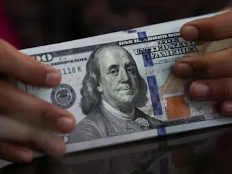 Dollar slips after rally, focus shifts to US-China trade talks