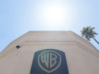 Warner Bros. Bonds Cut to Junk by Moody’s After Split Plan