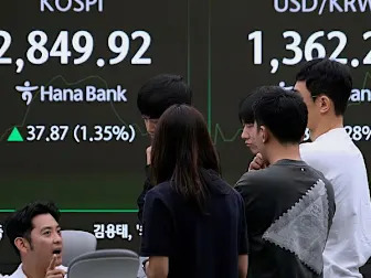 Asian shares make modest gains as investors eye US-China talks